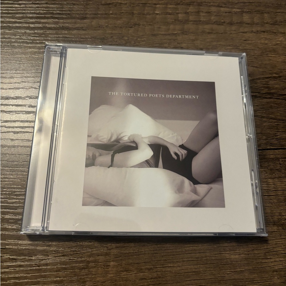 Signed TTPD CD. Never used, only opened to show autograph.